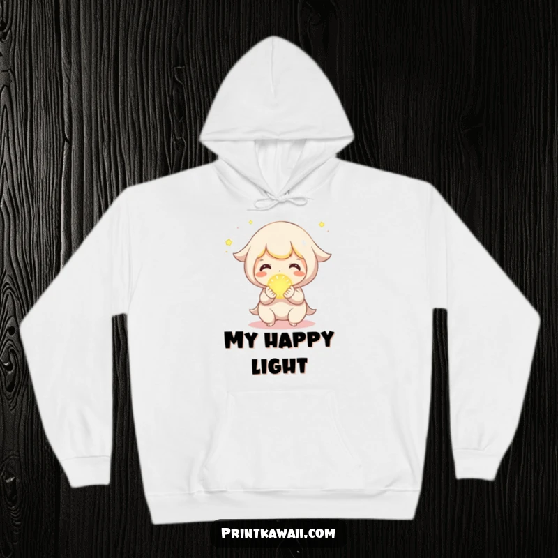 Funny Hoodie with a cute character joyfully presenting a tiny, glowing orb, symbolizing shared happiness.
